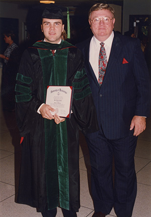 Dr. Mark Ladner's father, Dr. George Ladner, stands with him on medical school graduation day, 1992. (Photo courtesy of Dr. Mark Ladner)